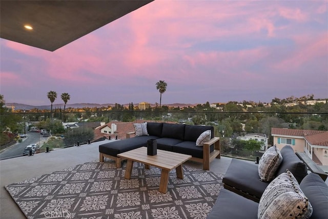 patio terrace at dusk with an outdoor living space