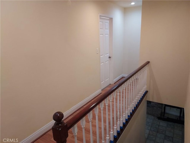 stairs featuring baseboards