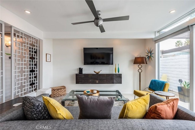 living area featuring recessed lighting, ceiling fan, and wood finished floors