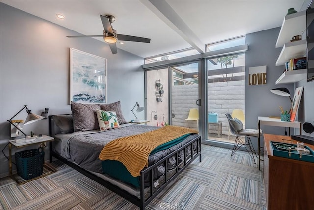 carpeted bedroom featuring beam ceiling, a wall of windows, and access to exterior