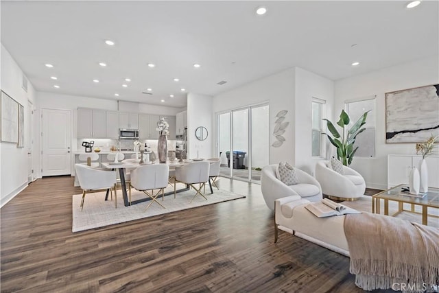 392 Baluster, Irvine, CA 92618 - living room featuring recessed lighting, baseboards, and dark wood finished floors