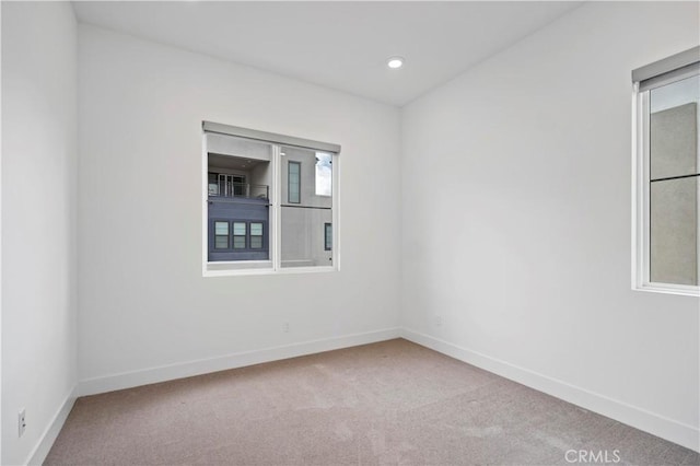 392 Baluster, Irvine, CA 92618 - spare room featuring recessed lighting, baseboards, and carpet