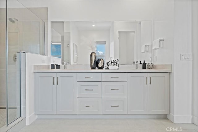 392 Baluster, Irvine, CA 92618 - bathroom featuring a sink, a stall shower, and double vanity