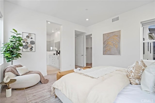 392 Baluster, Irvine, CA 92618 - bedroom featuring visible vents, light carpet, ensuite bath, recessed lighting, and baseboards