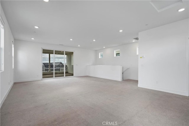 392 Baluster, Irvine, CA 92618 - spare room with visible vents, recessed lighting, baseboards, and carpet