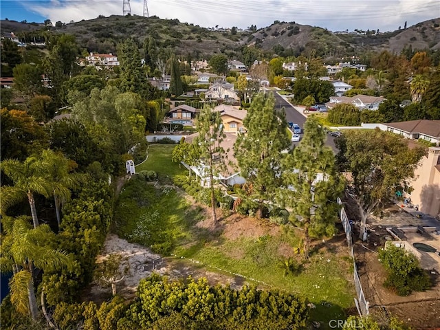 bird's eye view with a residential view and a mountain view