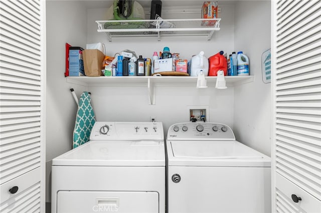 laundry area with washing machine and dryer and laundry area