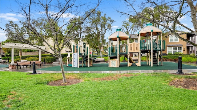 community jungle gym featuring a yard