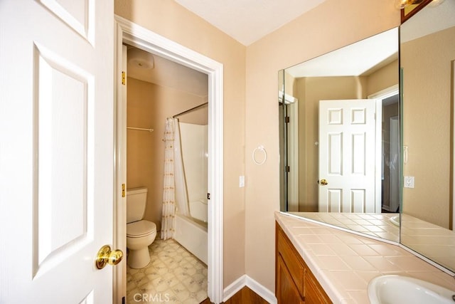 full bath with vanity, baseboards, shower / bath combo, tile patterned floors, and toilet