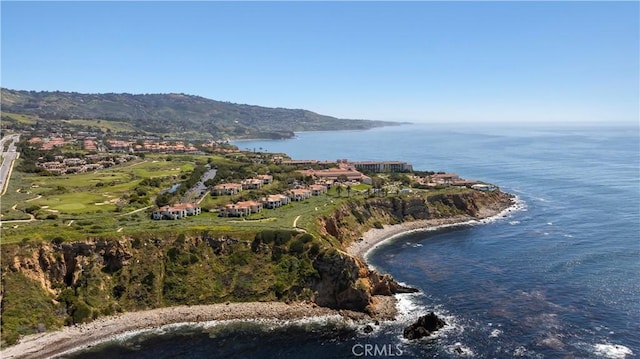 aerial view featuring a water and mountain view