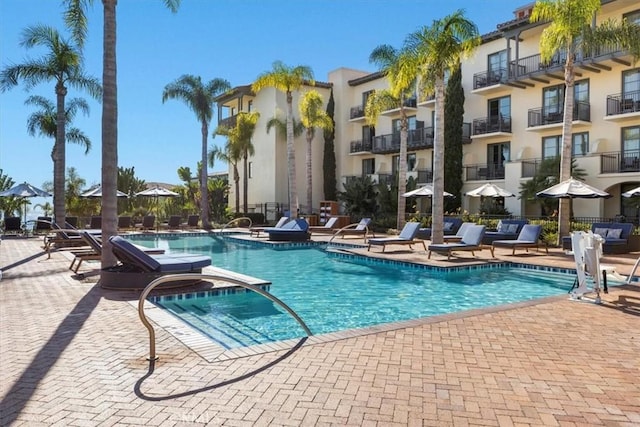 pool with a patio area