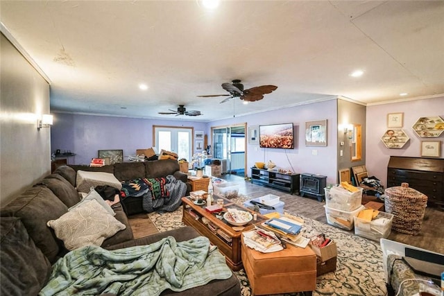 living area with crown molding, recessed lighting, wood finished floors, and ceiling fan