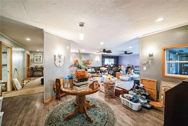 interior space featuring ceiling fan, recessed lighting, wood finished floors, and ornamental molding