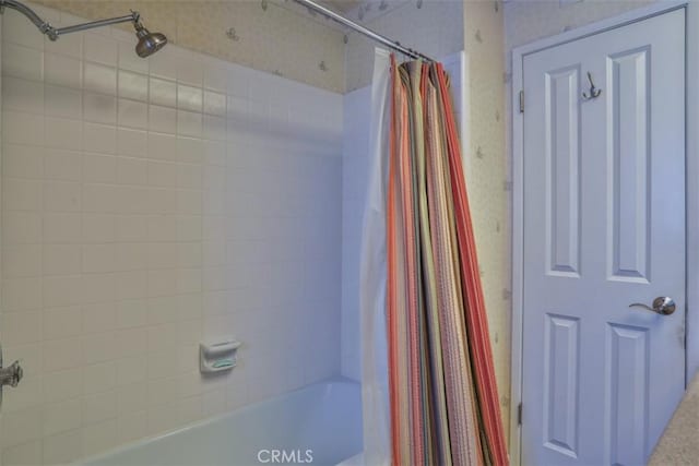 bathroom featuring shower / bath combination with curtain