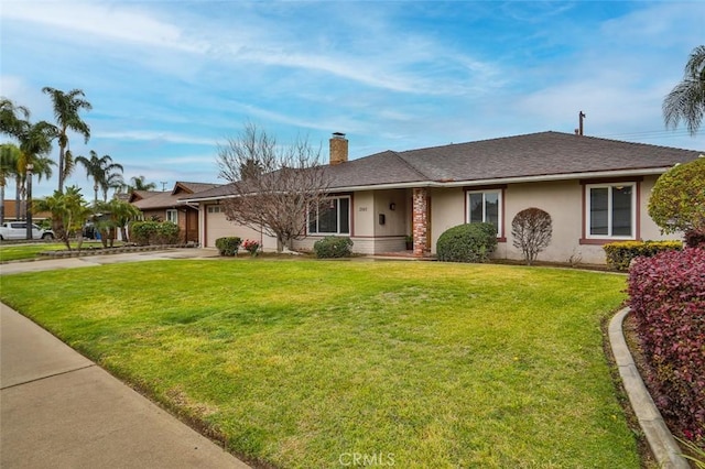 ranch-style house with a garage, a front lawn, a chimney, and driveway