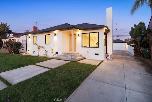 view of front facade featuring stucco siding, an outdoor structure, a front yard, crawl space, and a chimney