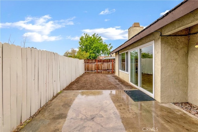 view of patio featuring a fenced backyard