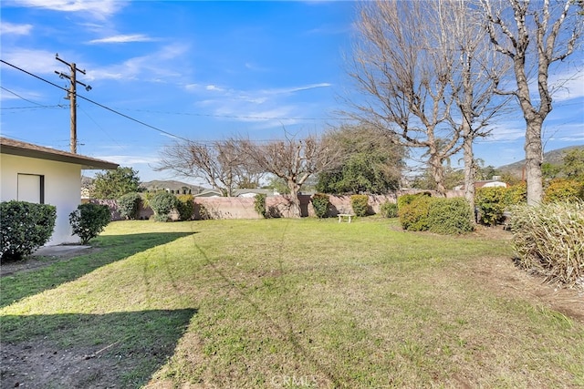 view of yard featuring fence