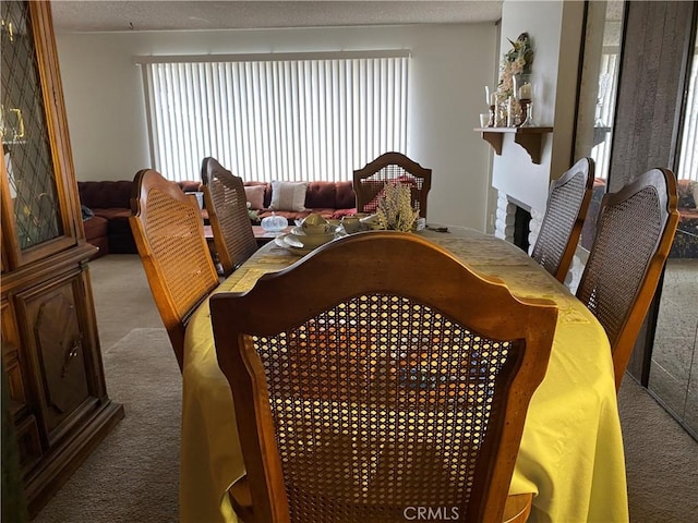 view of carpeted dining area