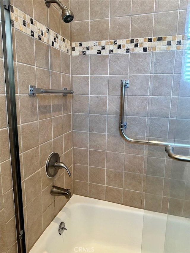 full bathroom with bathing tub / shower combination