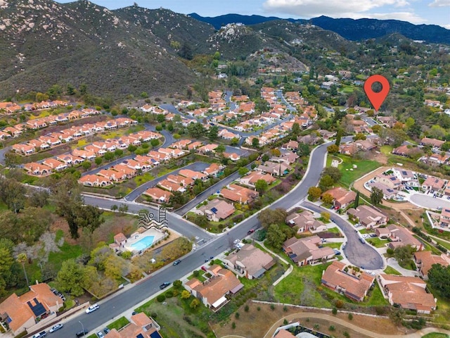 birds eye view of property featuring a residential view and a mountain view