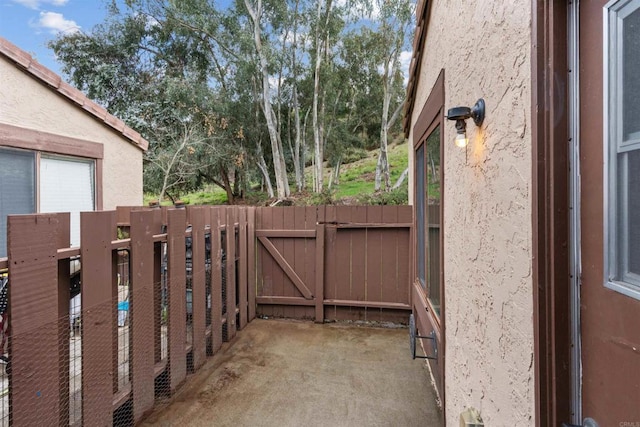 exterior space featuring a gate and fence