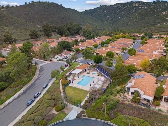 drone / aerial view with a mountain view and a residential view