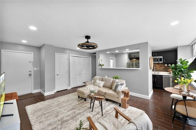 100 Atlantic Ave Unit 205, Long Beach, CA 90802 - living room with baseboards, dark wood-type flooring, and recessed lighting