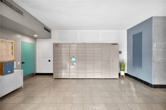 100 Atlantic Ave Unit 205, Long Beach, CA 90802 - view of community with a package area, recessed lighting, and a textured ceiling