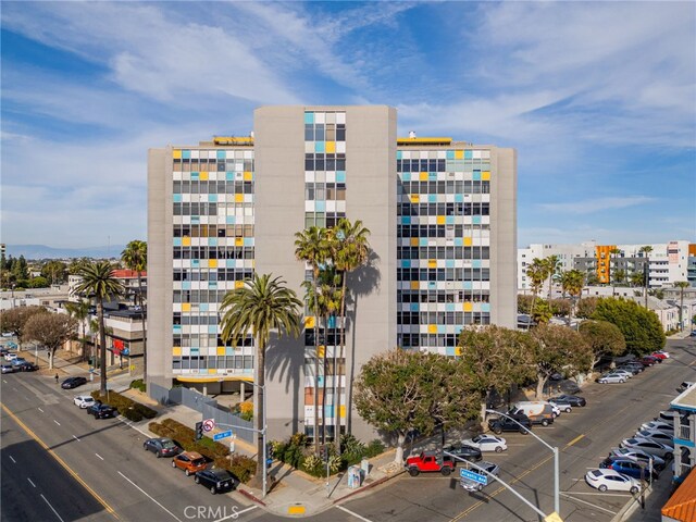 100 Atlantic Ave Unit 205, Long Beach, CA 90802 - view of building exterior featuring uncovered parking and a view of city