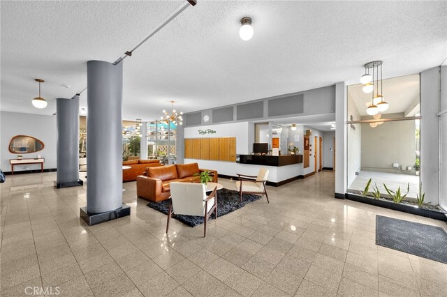 100 Atlantic Ave Unit 205, Long Beach, CA 90802 - building lobby with a textured ceiling