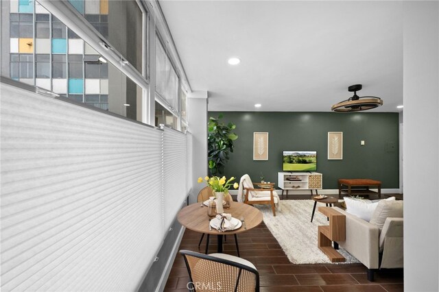 100 Atlantic Ave Unit 205, Long Beach, CA 90802 - living room featuring recessed lighting, wood tiled floors, healthy amount of natural light, and baseboards