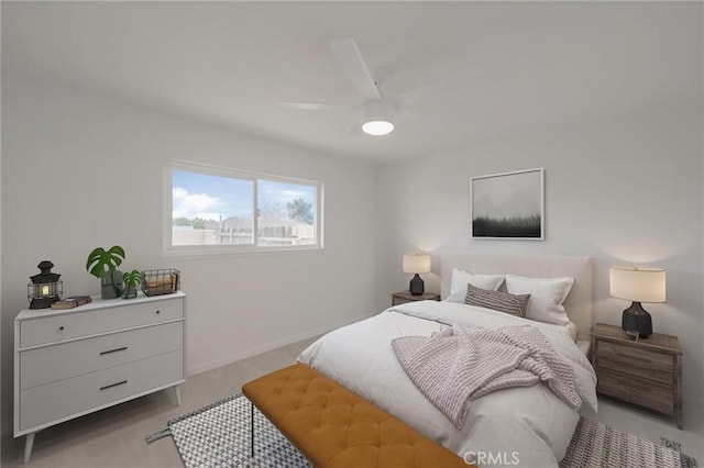 bedroom featuring light colored carpet, a ceiling fan, and baseboards