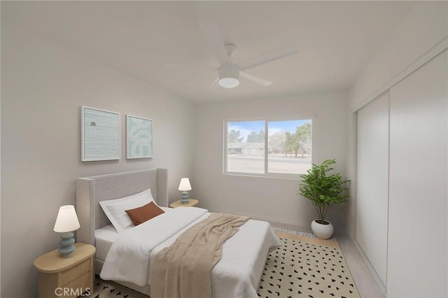 bedroom with baseboards, a closet, and a ceiling fan