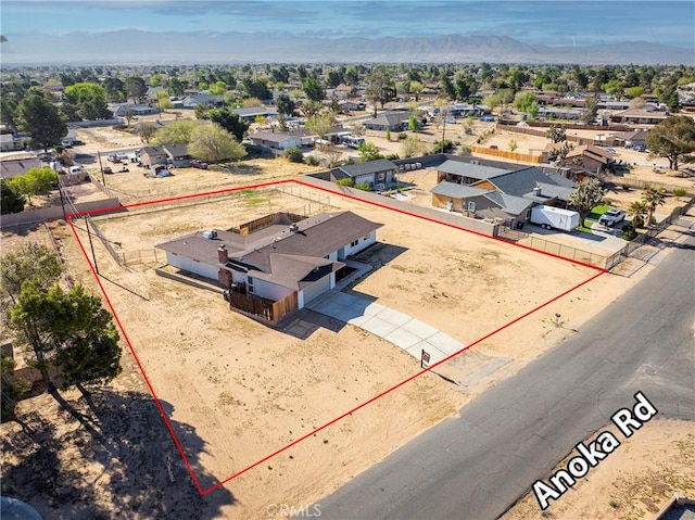 aerial view with a mountain view and a residential view