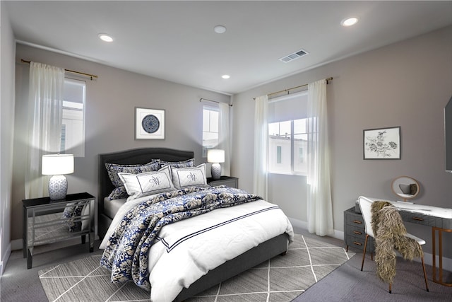 carpeted bedroom with recessed lighting, visible vents, and baseboards