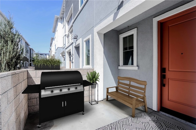 view of patio with a grill