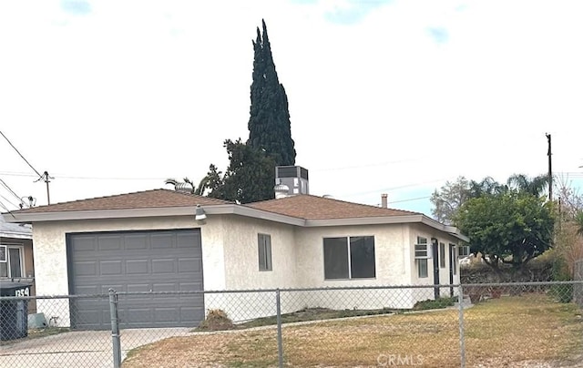 1354 W King St, San Bernardino, CA 92410 - view of property exterior with stucco siding, driveway, and central AC
