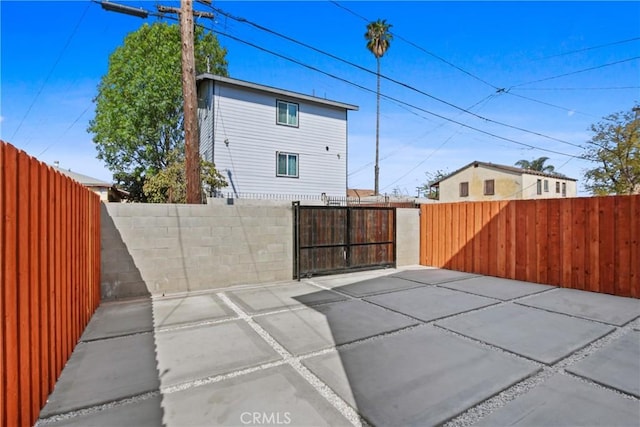 view of patio / terrace with a gate and fence private yard