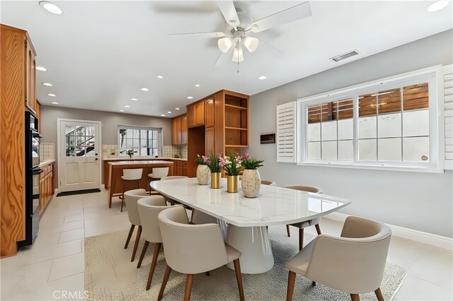 dining room with recessed lighting, visible vents, light tile patterned flooring, and a ceiling fan