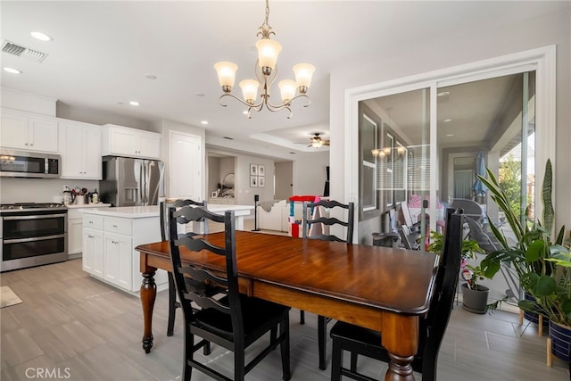 dining area with recessed lighting, visible vents, and ceiling fan with notable chandelier