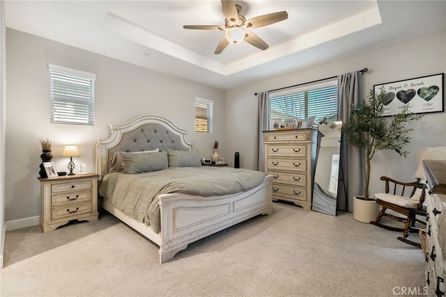 3460 Rogue River Dr, Chico, CA 95973 - bedroom with light carpet, a raised ceiling, and ceiling fan