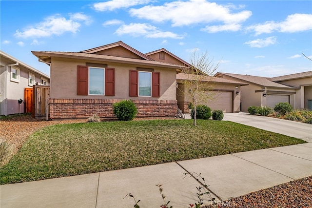 ranch-style home with stucco siding, brick siding, a garage, and a front yard