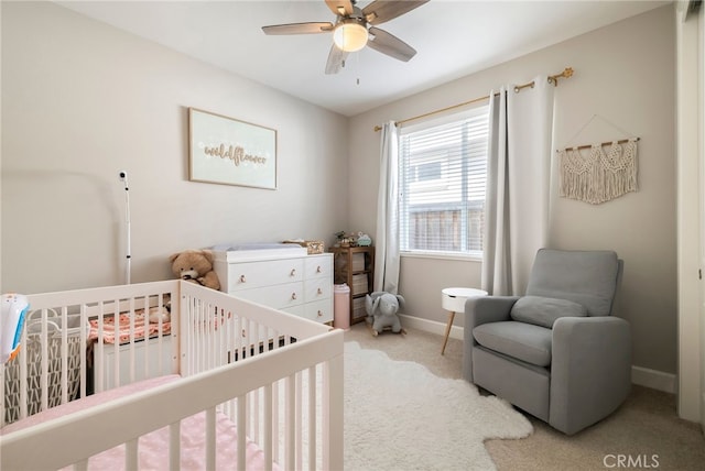 3460 Rogue River Dr, Chico, CA 95973 - bedroom featuring carpet flooring, a nursery area, baseboards, and ceiling fan