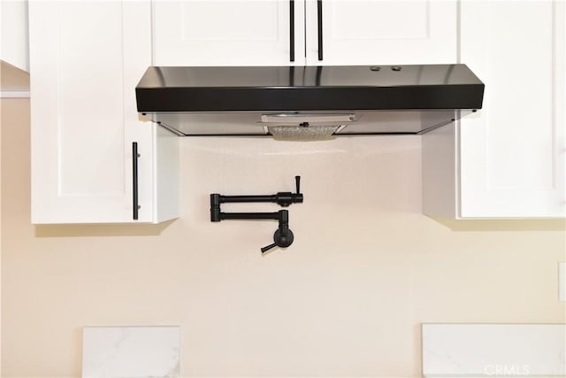 14730 Clark St, Baldwin Park, CA 91706 - kitchen view of white cabinets, under cabinet range hood, and pot filler