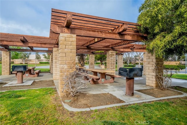 surrounding community with a patio and a pergola