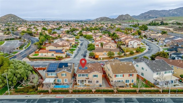 birds eye view of property featuring a residential view and a mountain view