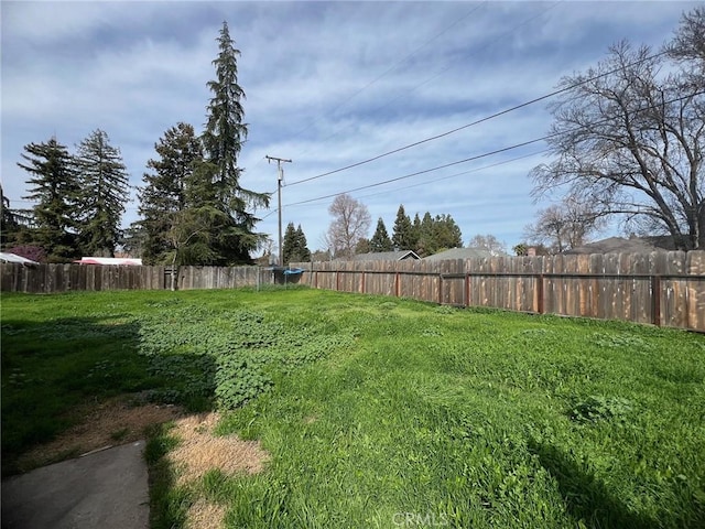 view of yard with fence