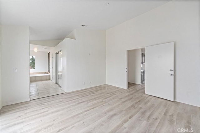 spare room featuring light wood finished floors