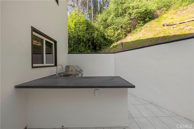 view of patio with a sink